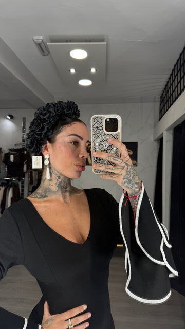 Flor negra larga