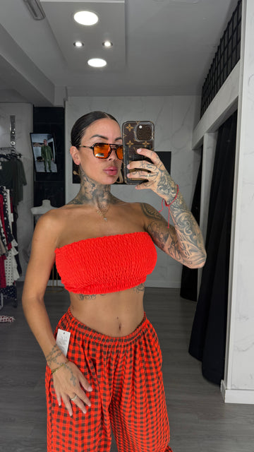 Top plisado naranja