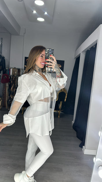 camisa transparente blanca